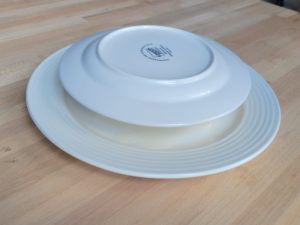 Photo of a plate on top of a block of tofu