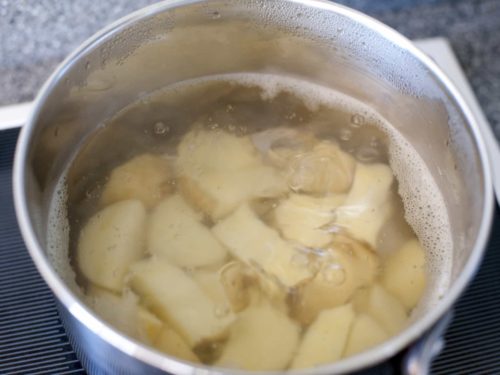 Photo of Quartered Potatoes in Water