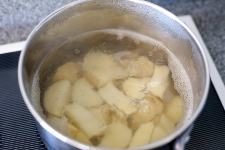 Photo of Quartered Potatoes in Water