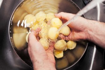 Photo of Rinsing Quartered Potatoes