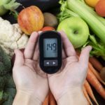 Diabetic Renal Diet - Holding Glucose Monitor